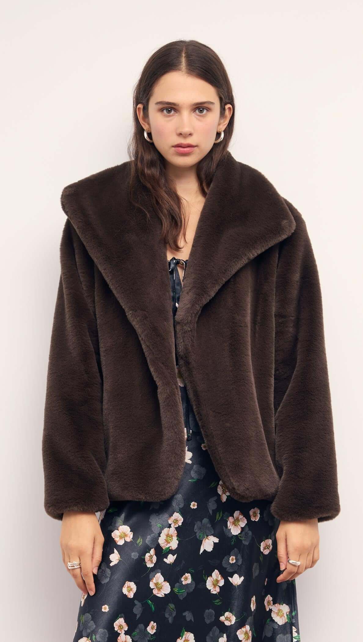 Model wearing a Brown Faux Fur Coat with oversized collar, showcasing the soft material and relaxed fit.