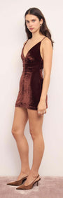 Chocolate Velvet V-Neck Mini Dress displayed on a model, showcasing a sleek silhouette and luxurious fabric.