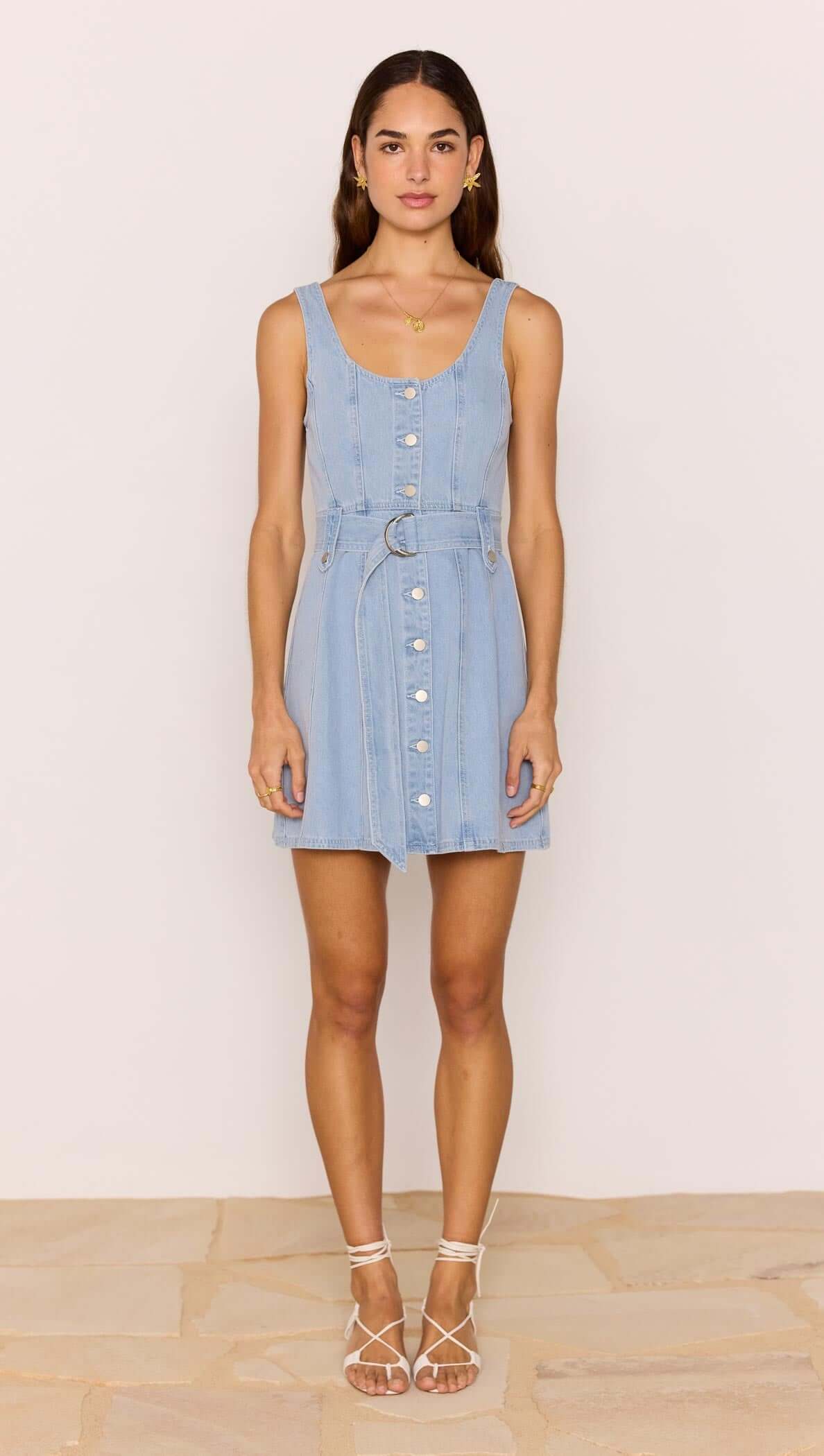 Denim Button Mini Dress featuring a button-through front and adjustable belt, perfect for warm days.