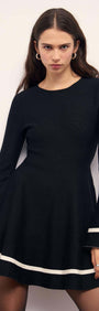 Black Peplum Knit Mini Dress With Contract Trim featuring flared sleeves and chic contrast trim.