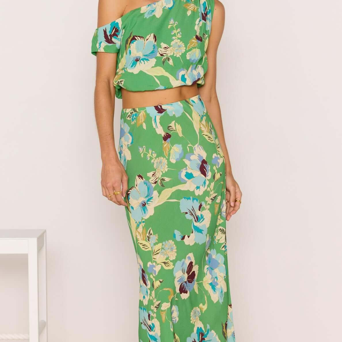 Green Floral Bias Midi Skirt in vibrant green floral print, perfect for summer parties and casual wear.