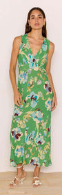 Green Floral Bias V-Neck Midi Dress worn by a model, showcasing vibrant floral print and relaxed fit.