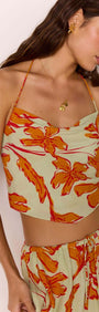 Green & Orange Floral Cowl Neck Scarf Top worn by model, showcasing sunset floral print and halter design.