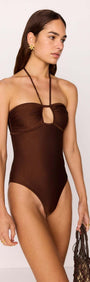 Model wearing a Halter-Neck One Piece Swimsuit in Chocolate Brown with Cut-Out Detail, showcasing a braiding halter tie.