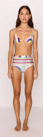 Model wearing a High-Waist Bikini Pant in vibrant multicolour print, showcasing a stylish summer look.
