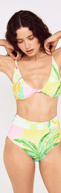 Model wearing a Palm Print Knot Bikini Top with vibrant tropical patterns and high-waisted bottoms.