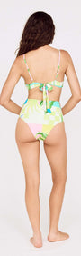 Back view of a woman wearing a Palm Print High Waisted Bikini Bottom, showcasing vibrant tropical patterns.