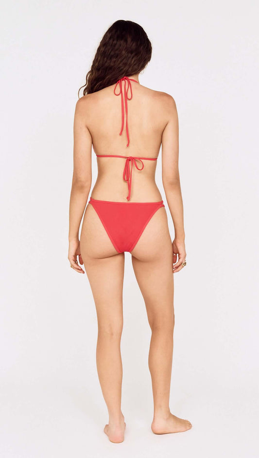 Grapefruit Strappy Bikini Bottom with Shell Detail, showcasing the back view of a model wearing a stylish bikini.