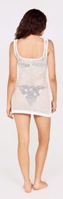 White Crochet Mini Dress with Embroidered Shellfish worn by a model, showcasing its back design and detailing.