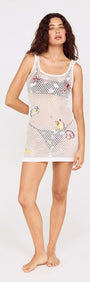 White Crochet Mini Dress with Embroidered Shellfish on a model, showcasing a stylish beach look.
