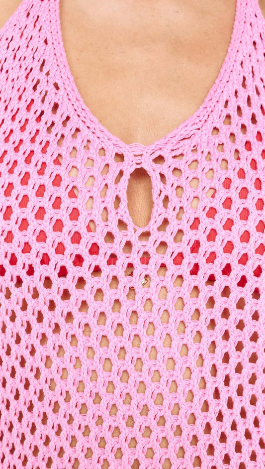 Close-up of a Baby Pink Crochet Mini Dress with Halter Neck showcasing its intricate crochet design.