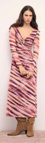 Model wearing the Pink & Purple Striped Mesh Midi Dress featuring a plunging neckline and long sleeves.