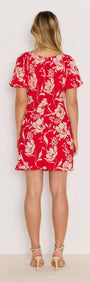 Back view of the Poppy Mini Dress in bold red floral print with floaty short sleeves and mini length.