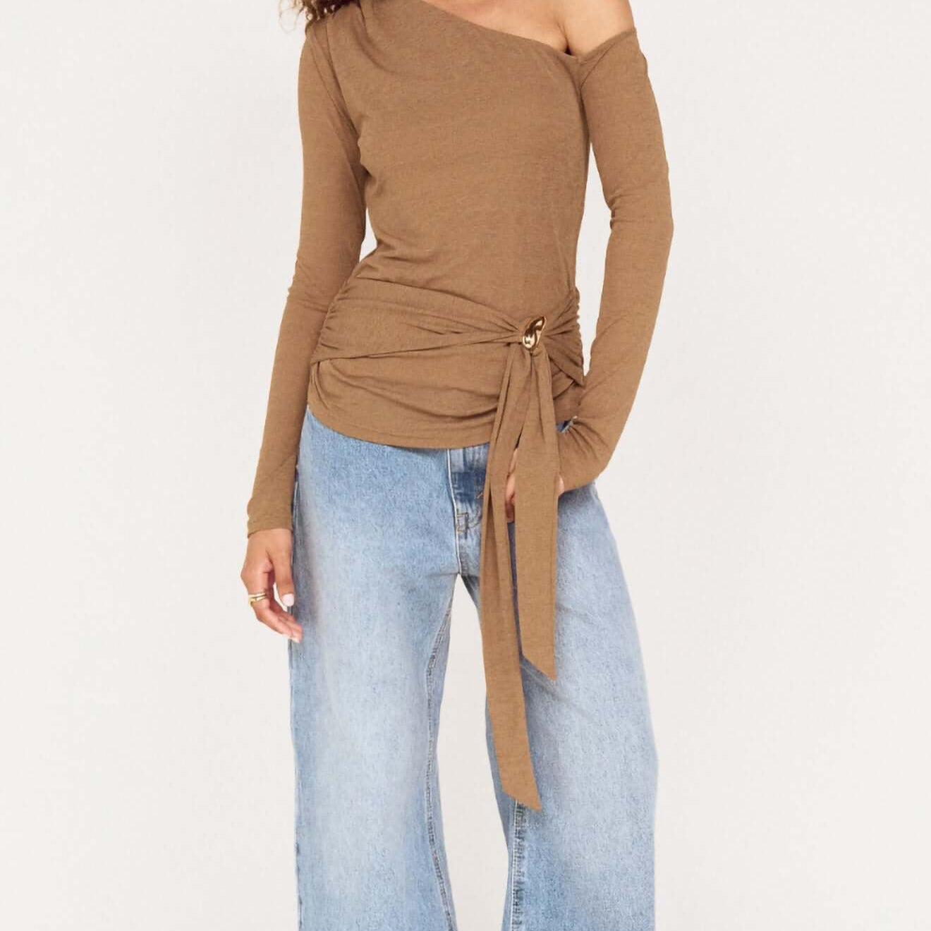 Coffee Off Shoulder Mesh Top with Tie Detail displayed on a model, featuring a modern design in a soft, stylish fabric.