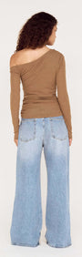 Back view of Coffee Off Shoulder Mesh Top with Tie Detail paired with wide-leg jeans, showcasing a chic casual style.