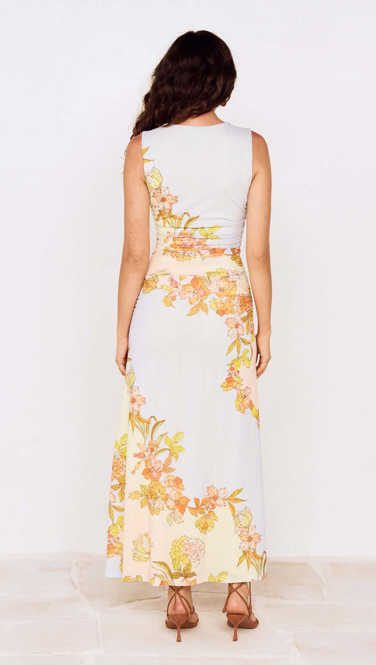 Pastel Floral Sleeveless Midi Dress back view showcasing floral print and ruched design.