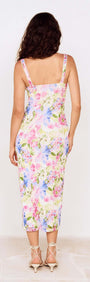 Back view of model wearing Watercolour Floral Mesh Midi Dress with floral pattern and spaghetti straps.