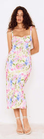 Model wearing a Watercolour Floral Mesh Midi Dress with colorful floral design and a fitted silhouette.