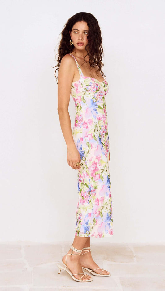 Model showcasing the Watercolour Floral Mesh Midi Dress with multicolored floral print, perfect for occasion dressing.