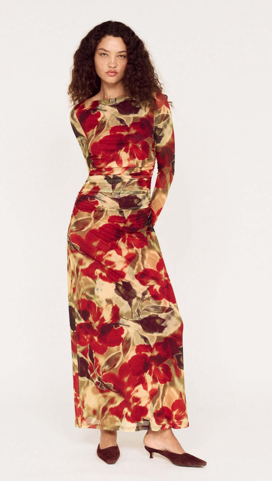 Red Floral Sheer Mesh Midi Dress modeled by a woman, showcasing a vibrant floral design in red and beige tones.