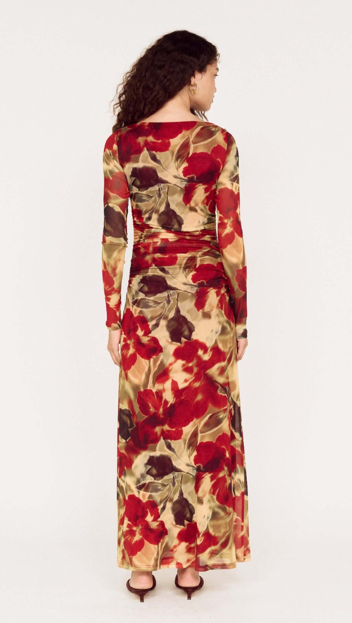 Back view of the Red Floral Sheer Mesh Midi Dress, showcasing its vibrant floral pattern and elegant design.