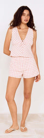 Model wearing Pink Gingham Cotton Baby Shorts paired with a matching gingham top, perfect for summer styling.