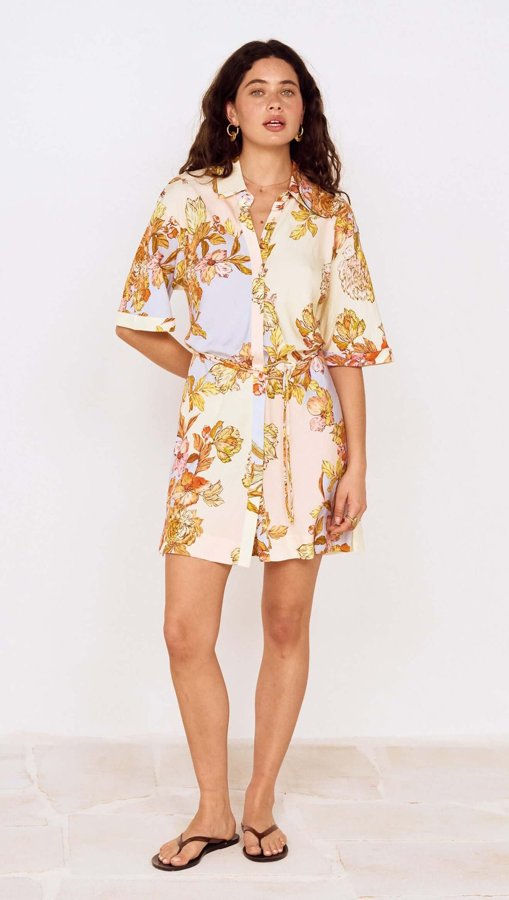 Pastel Floral Mini Shirt Dress featuring oversized florals and a relaxed fit, perfect for an elevated everyday style.