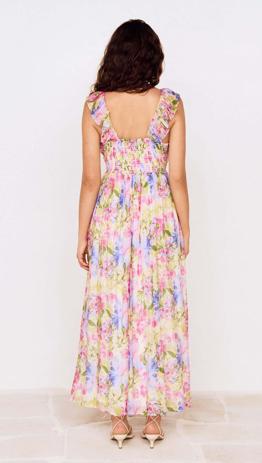 Watercolour Floral Ruffle Maxi Dress showing the back view with ruffle shoulder straps and colorful floral pattern.
