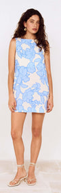 Model wearing a Blue Floral Print Mini Shift Dress with blue floral design on a light background.