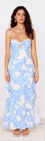 Blue Floral Twist Front Maxi Dress with Side Split on a model, featuring floral patterns and a side split.