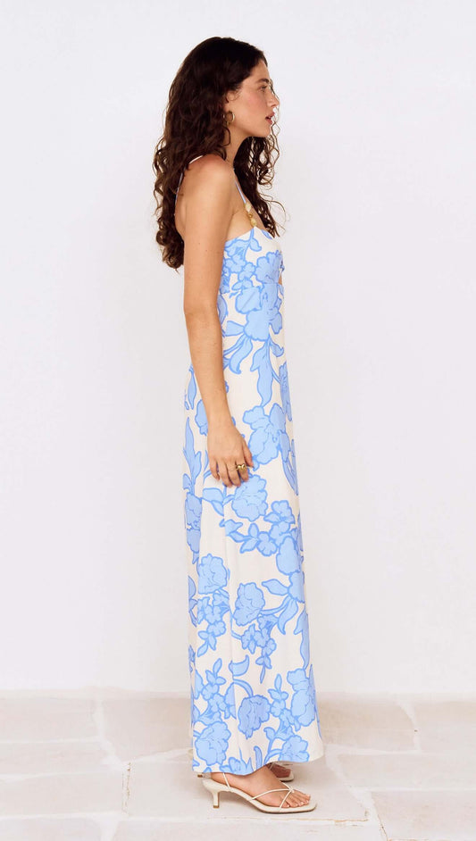 Blue Floral Twist Front Maxi Dress with Side Split showcased on model in profile view.