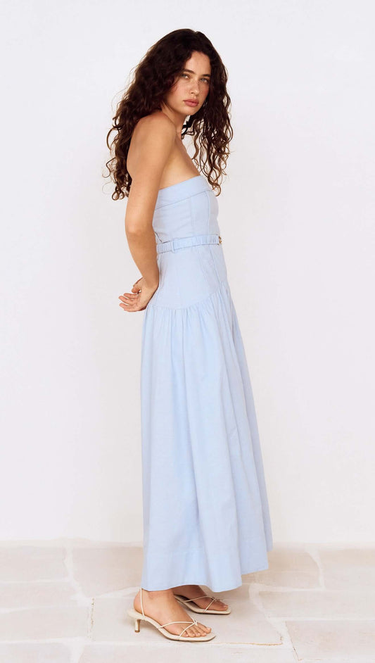 Baby Blue Drop Waist Midi Dress with Belt Detail on a model, showcasing its stylish summer look.