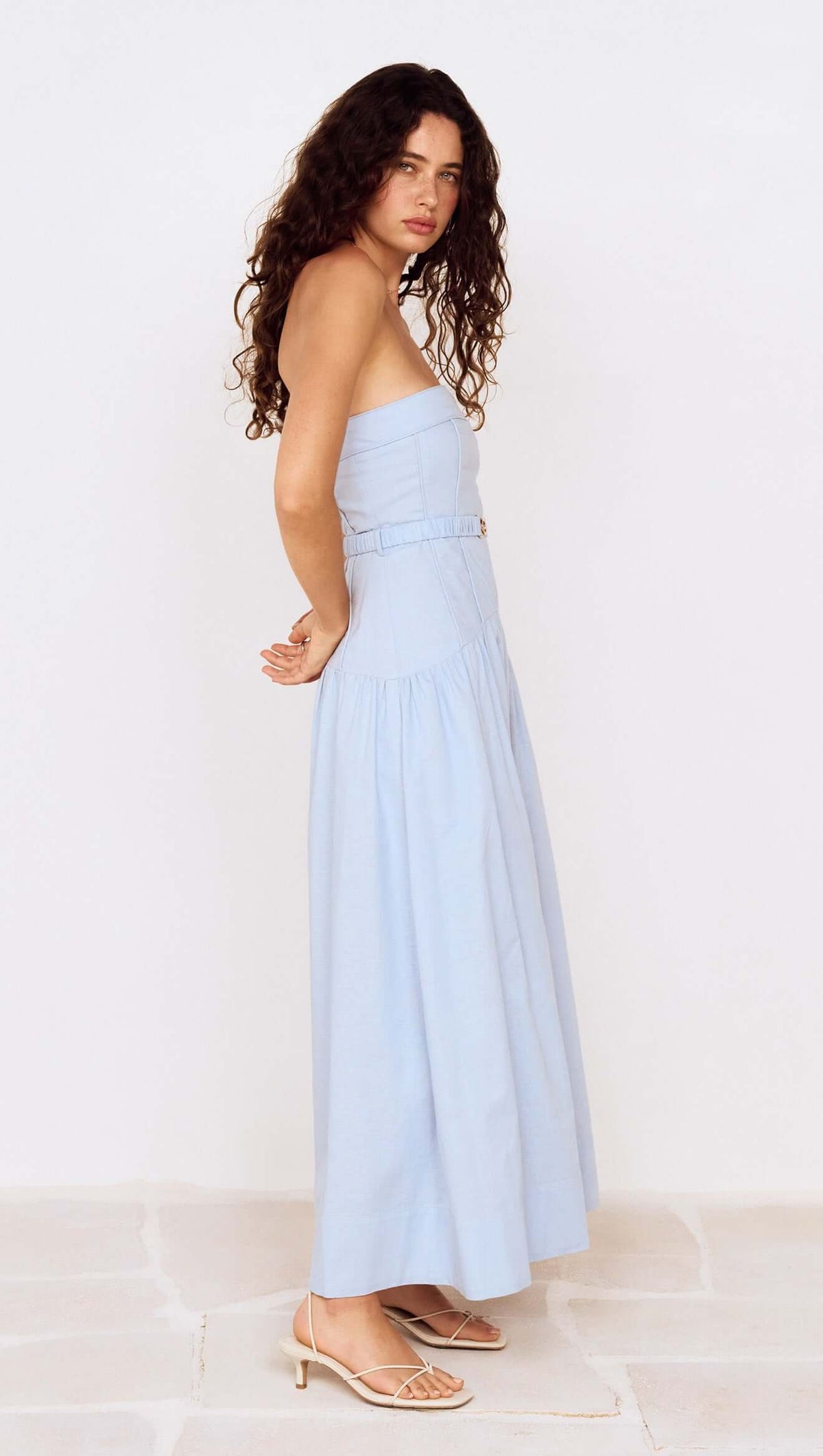 Baby Blue Drop Waist Midi Dress with Belt Detail on a model, showcasing its stylish summer look.