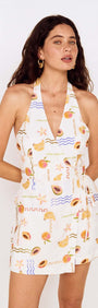 Fruit Print Halter Neck Romper featuring a vibrant fruit pattern and a flattering halter neckline, perfect for summer outings.