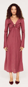 Burgundy Pinstripe Bias Cut Midi Dress worn by a model, featuring a plunging V-neckline and tie-front detailing.