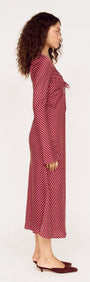 Burgundy Pinstripe Bias Cut Midi Dress shown in profile view with tie-front detailing and flared sleeves.