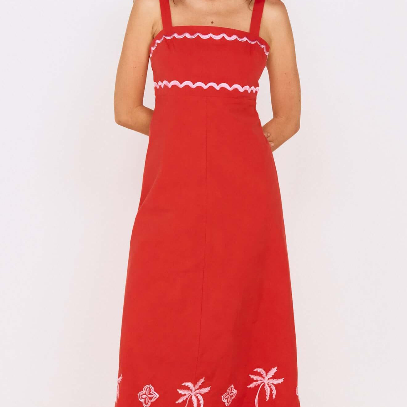 Model wearing a Red and Pink Embroidery Detail Midi Dress with embroidered palm design.