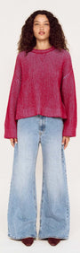 Model wearing Blue and Berry Contrast Rib Knit Jumper with flared jeans, showcasing a stylish two-tone knitwear look.
