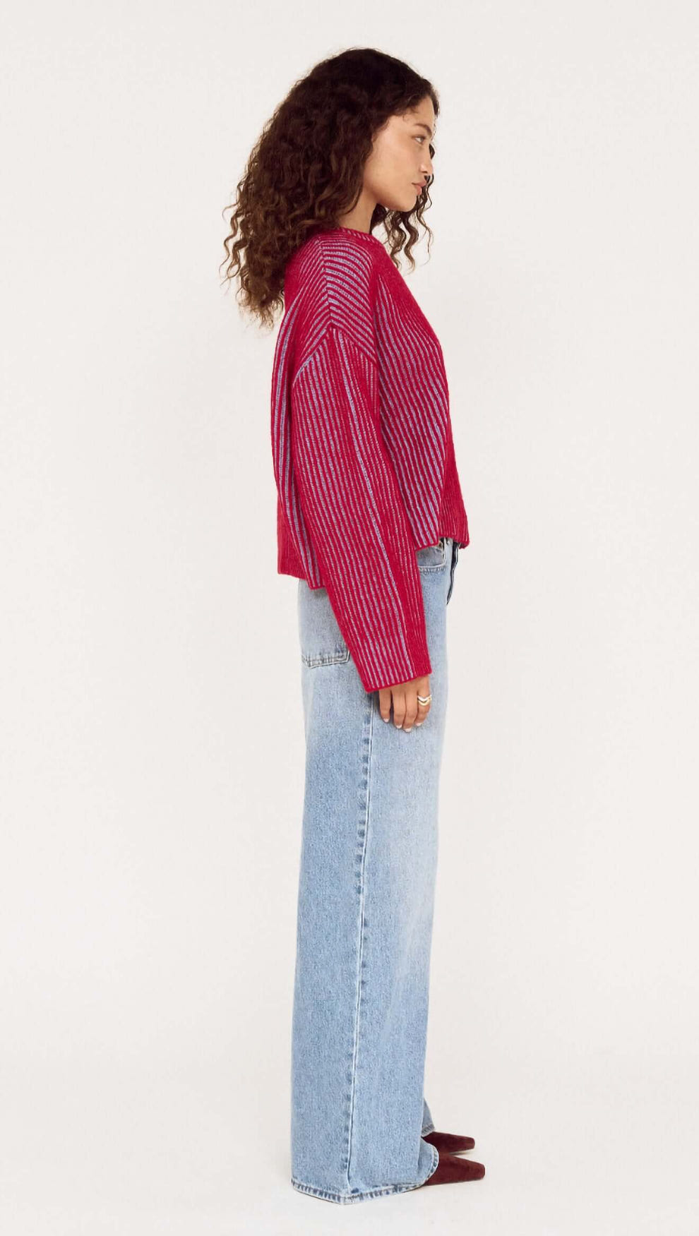 Side view of Blue and Berry Contrast Rib Knit Jumper paired with light blue jeans, showcasing modern knitwear style.