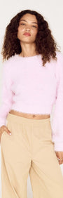 Cropped Baby Pink Fluffy Jumper worn by a model, showcasing its soft and stylish design, perfect for casual outfits.