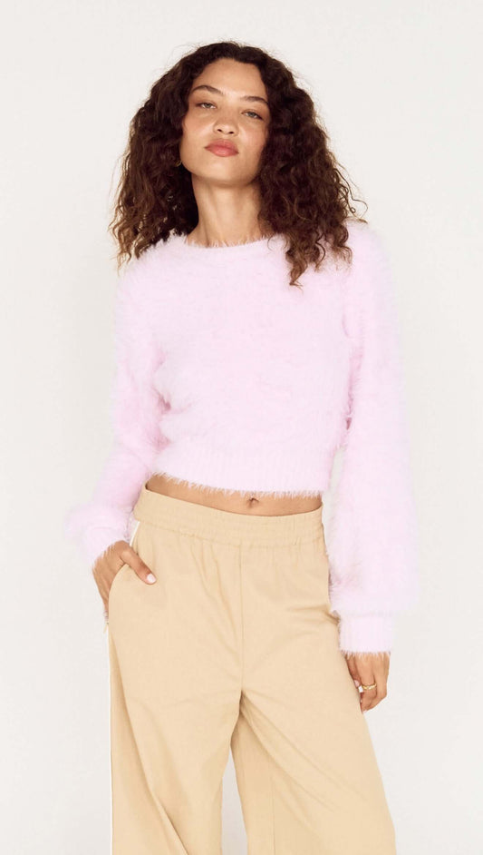 Cropped Baby Pink Fluffy Jumper worn by a model, showcasing its soft and stylish design, perfect for casual outfits.