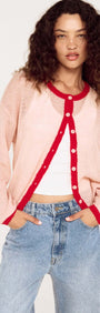 Sheer Contrast Trim Pink Cardigan worn by model, featuring playful colors and soft fabric for a stylish look.