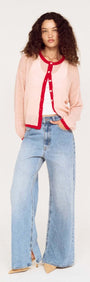 Sheer Contrast Trim Pink Cardigan styled with a white tank top and wide-leg jeans.