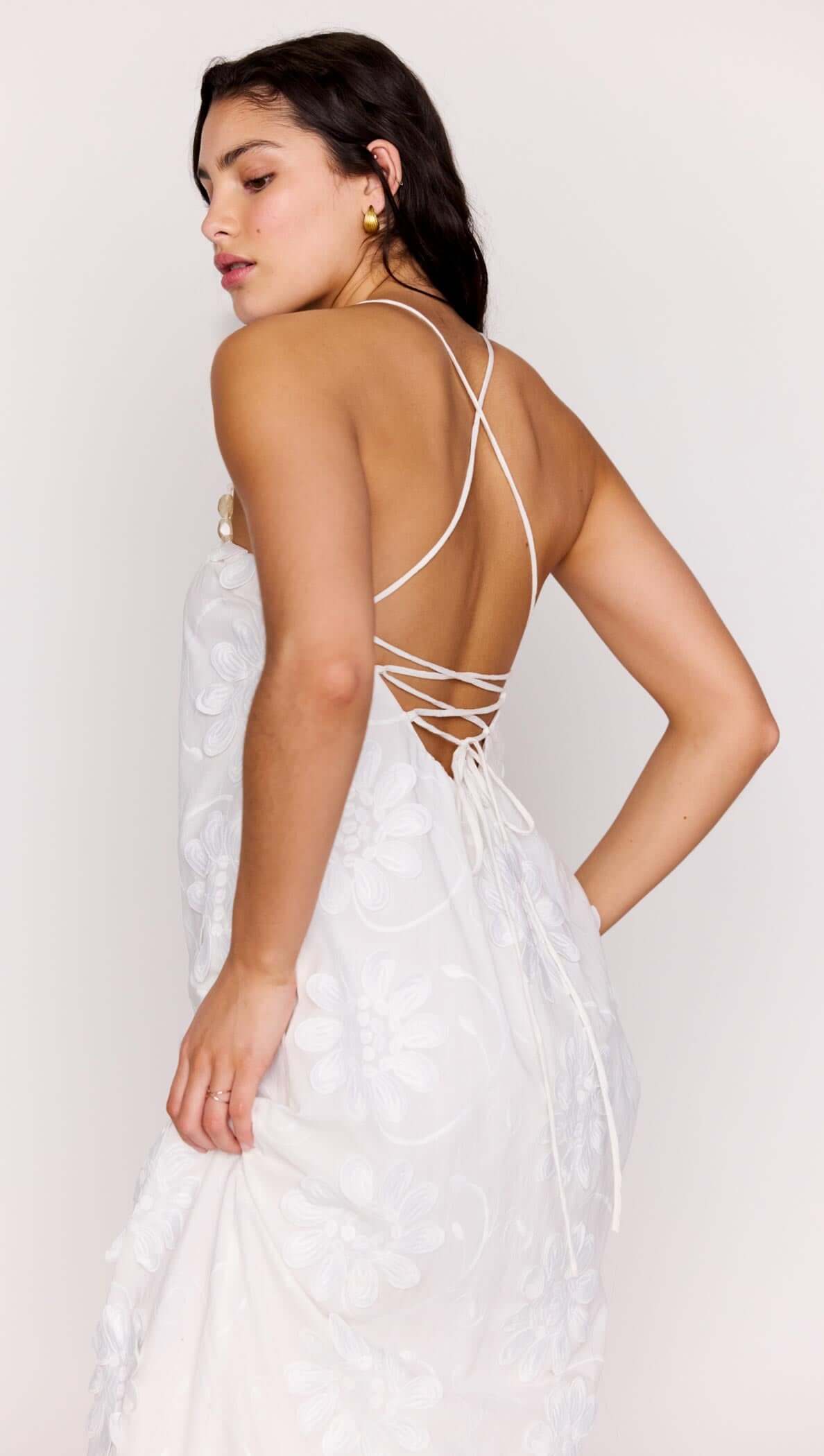 White Cotton Floral Applique Lace-Back Maxi Dress featuring a stunning lace-up back and floral details.