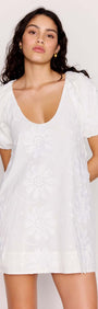 White Cotton Floral Applique Smock Mini Dress with puff sleeves and scoop neckline, perfect for warm-weather dressing.