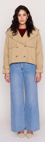 Beige Cotton Drill Cropped Trench styled with wide-leg denim and heels, showcasing a modern, structured design.