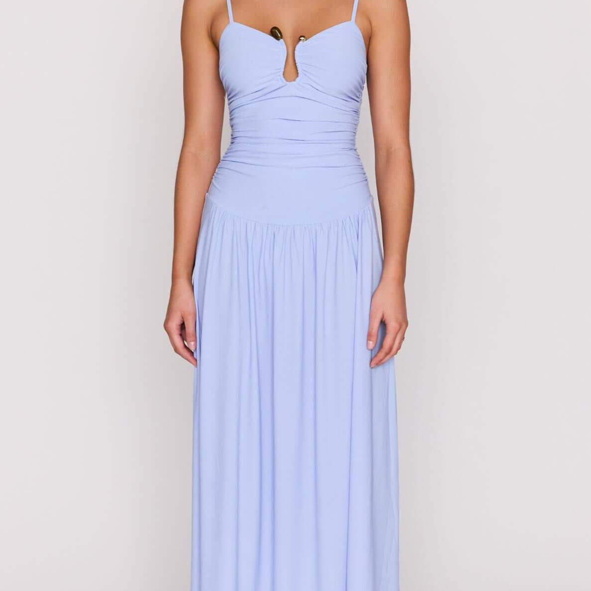 Model wearing a Powder Blue Mesh Drop Waist Maxi Dress featuring a ruched bodice and keyhole detail.