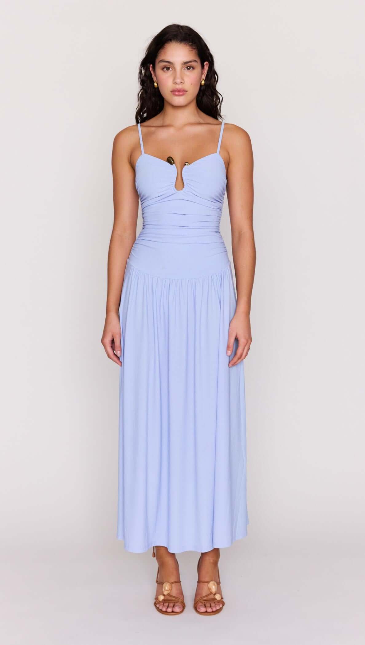 Model wearing a Powder Blue Mesh Drop Waist Maxi Dress featuring a ruched bodice and keyhole detail.