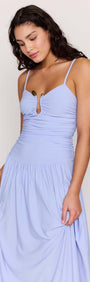 Model wearing a Powder Blue Mesh Drop Waist Maxi Dress featuring a ruched bodice and keyhole detail.