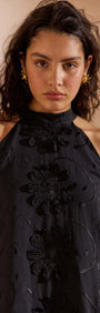 Black Cotton Applique High Neck Mini Dress featuring floral details and halter neckline.